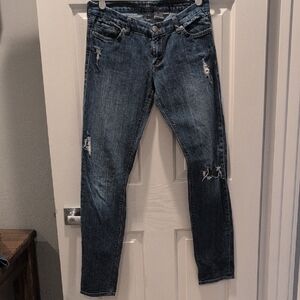 Blue Skinny Distressed Jeans with Tapered Leg